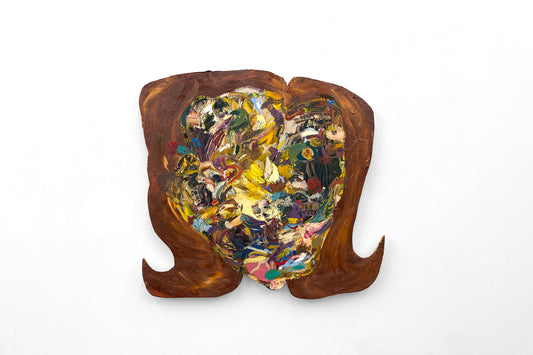 髪の毛を茶色に染めた人